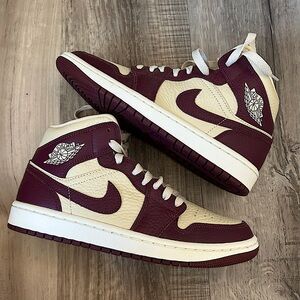 Nike Air Jordan’s maroon/tan women’s size 7.5 never worn